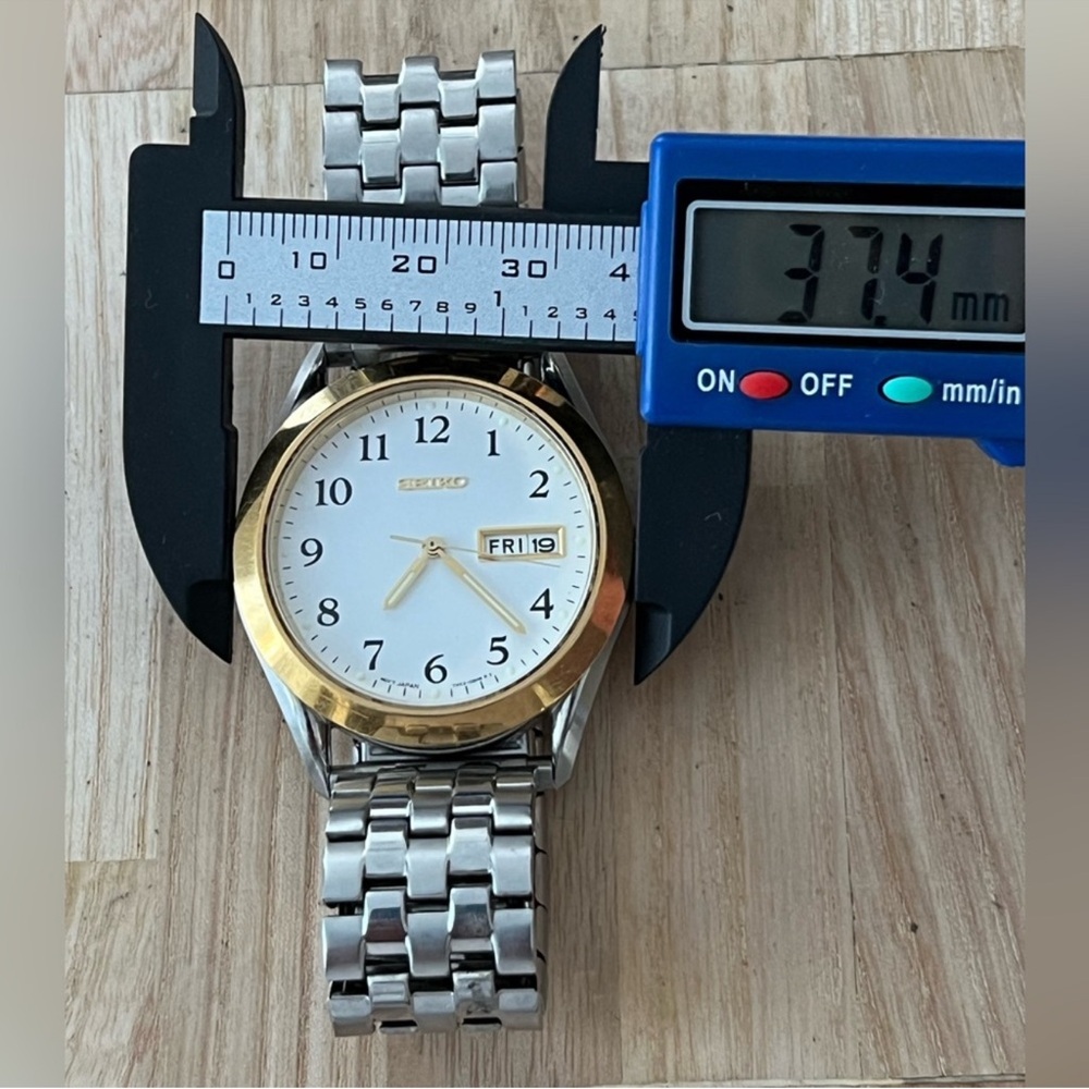 Seiko Men's Watch Stainless Stretch Bracelet Gold Case White Dial Date Window - Picture 9 of 11